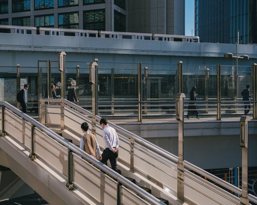 Urban commuters walking comfortably in the city